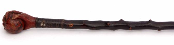 Swagger stick/switch, the ebonised nobbled shaft to a handle modelled in the form of a hand