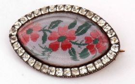 Georgian marquise shaped paste set brooch, the glazed central panel with a woven floral silk design,