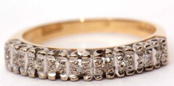 18ct gold and diamond half-eternity ring featuring nine small diamonds raised in a pierced C-