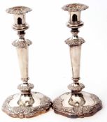 Pair of late 19th century silver on copper candlesticks, each with urn shaped sconces and detachable