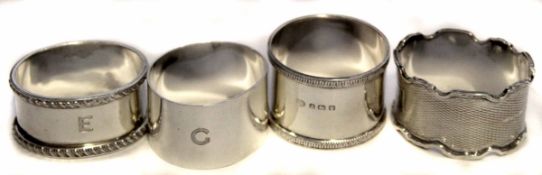A group of four various silver serviette rings various dates gross weight 132gms