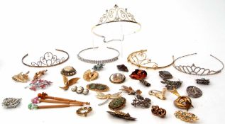 Tray of costume jewellery to include five paste set tiaras, various brooches etc