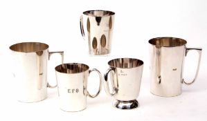 Mixed Lot: comprising two electro-plated tankards, each of polished cylindrical form, together