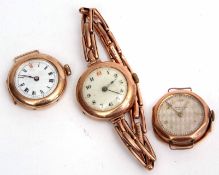 Mixed Lot: comprising three various 9ct gold ladies dress watches (conditions vary throughout),