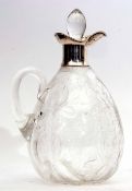 Edward VII silver mounted and clear cut glass claret jug, the ovoid body cut with stylised