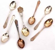 Mixed Lot: comprising seven various golfing related tea spoons, combined weight approx 96gms,