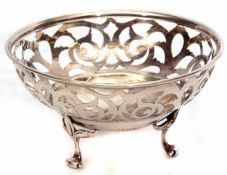 George V bon-bon basket of circular form with pierced gallery and polished centre raised on three