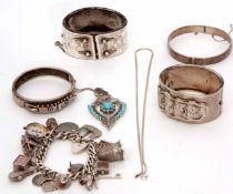 Mixed Lot: two Victorian silver wide hinged bracelet, each with buckle and engraved design,