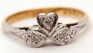 Precious metal and diamond set ring, a design of a three-leaf clover, each leaf set with a small