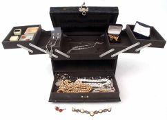 Black travelling leatherette folding jewel box to include white metal and amber ring, matching