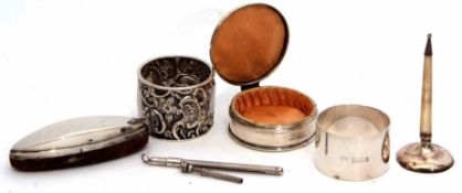 Mixed Lot: comprising two various cylindrical napkin rings together with a small circular trinket