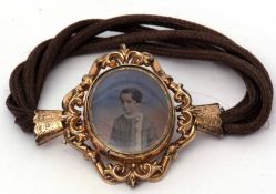 Victorian hair bracelet with a gilt metal portrait glazed clasp, having a photographic portrait of a