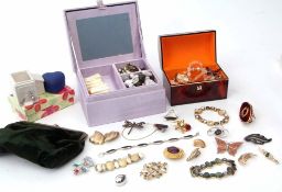 Large quantity of costume jewellery to include necklaces, brooches etc