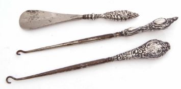 Mixed Lot: comprising two various silver handled large button hooks, together with a further