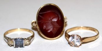 Mixed Lot: 9ct gold carnelian intaglio ring, London 1966, together with two 9ct gold dress rings (3)