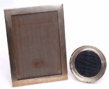 Mixed Lot: two various silver mounted easel backed photograph frames, the first of plain polished