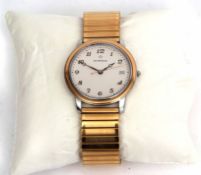 Gold plated and steel quartz centre seconds calendar wrist watch, Eterna, the quartz movement to