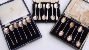 Mixed Lot: comprising three various cased sets of tea and coffee spoons including seal top and