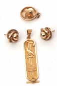 Mixed Lot: yellow metal Egyptian cartouche pendant, a sombrero pendant stamped 14K, together with