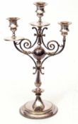 Early 20th century electro-plated three-light candelabra with three urn shaped sconces over flared