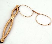 Pair of modern gilt finished folding spectacles, width 12cm
