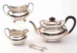 Early 20th century electro-plated three-piece tea set of oval form with flared rims with cast and