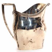 George V milk jug of helmet form with reeded rim and applied handle, height 10 1/2cm, weight