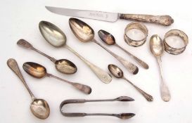 Mixed Lot: seven various spoons together with two cylindrical napkin rings and a silver handled