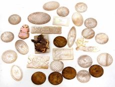 Mixed Lot: comprising mother of pearl gaming counters together with 19th century brass tokens and