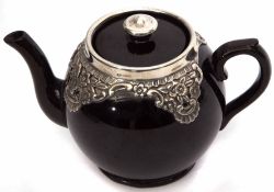 Edward VII silver mounted pottery tea pot of globular form with all over dark brown treacle glaze