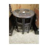 CIRCULAR CARVED TOP MOORISH TYPE TABLE WITH HEXAGONAL FOLDING BASE