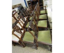SET OF EIGHT CHIPPENDALE DINING CHAIRS WITH PIERCED SPLAT BACKS AND HEAVILY CARVED FRONT CLAW AND