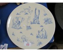 PLATE DECORATED WITH AFRICAN ANIMALS IN BLUE, THE REVERSE WITH FACTORY MARK FOR DROSTDY, MADE IN