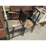 EBONISED RATTAN SEATED BEDROOM CHAIR TOGETHER WITH AN OAK FRAMED PANEL BACK ARMCHAIR