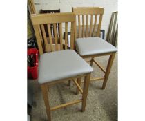 TWO LIGHT OAK UPHOLSTERED BAR STOOLS