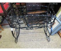 TWISTED METAL PLANTER WITH CARTWHEEL ENDS