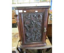 OAK FRAMED HEAVILY CARVED FRONTED SMALL WALL MOUNTED CORNER CUPBOARD
