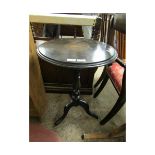 EBONISED CIRCULAR WINE TABLE ON TRIPOD BASE WITH INLAID CENTRE PANEL