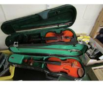 TWO CASED VIOLINS