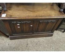 OAK FRAMED COFFER WITH LINENFOLD DETAIL TO FRONT