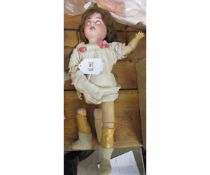 Turn of the century Armand Marseille small jointed doll, dated 1894, with opening eyes, approx 31cm