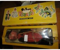 Two boxed Pelham puppets, one formed as a witch, the other as a clown