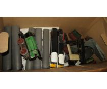 Box containing a good quantity of various model rail rolling stock and track side accessories,