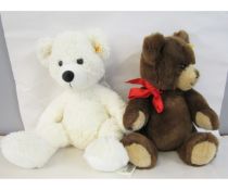 Two modern Steiff plush bears, one white, the other mid-brown, larger approx 40cm