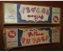 Two boxed vintage Pelham puppets, each a standard puppet and depicting a boy and girl