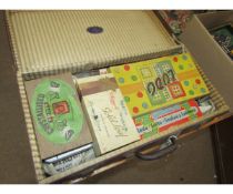 Vintage suitcase containing collection of various 1960s onwards board games including Ludo, Snakes &