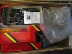 Box containing a quantity of Hornby 00 gauge track side accessories, some boxed, some unboxed