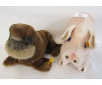 Two modern Steiff plush animals, a pig and a walrus, each approx 22cm tall