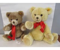 Two modern Steiff plush bears, one beige, the other light brown, larger approx 38cm