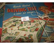 Boxed Ideal Crossfire game, together with a Merit remote control driving test game, also boxed, both